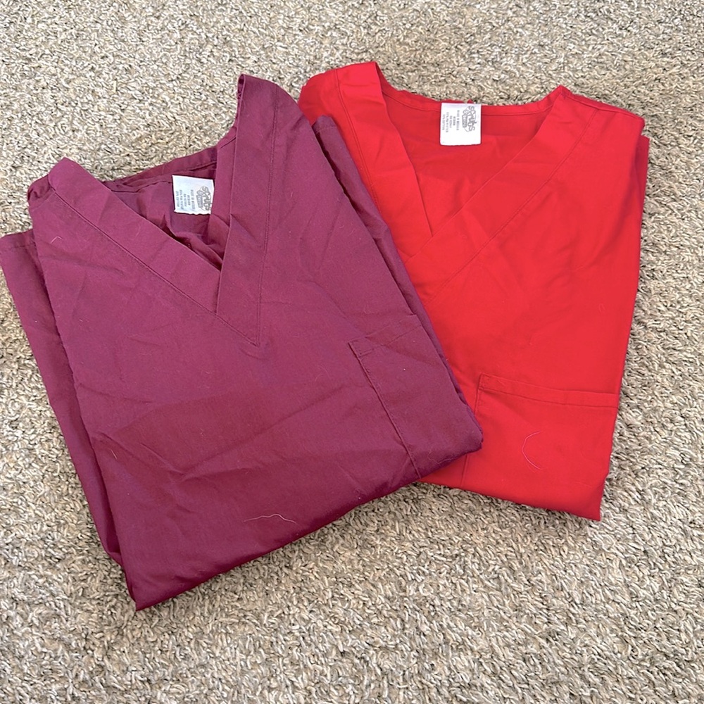 2 Scrubs and Beyond scrub tops red and maroon.